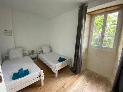 Un ou plusieurs lits dans un hébergement de l'établissement Gîte la Chauvinière 1