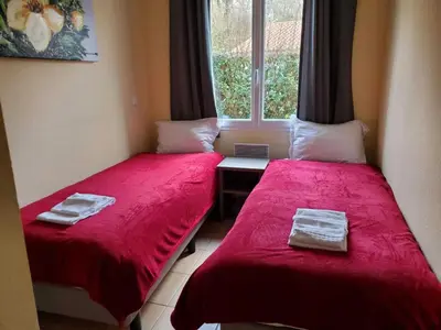 Un ou plusieurs lits dans un hébergement de l'établissement Villa in Les Forges with Golf & Pool Access