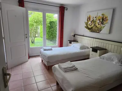 Un ou plusieurs lits dans un hébergement de l'établissement Villa in Les Forges with Golf & Pool Access