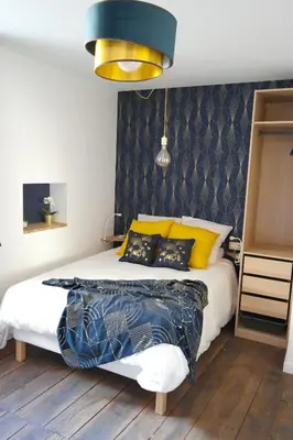 Un ou plusieurs lits dans un hébergement de l'établissement Et Pop Et Chic, la maison !