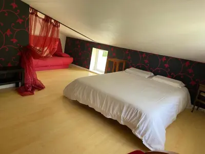 Un ou plusieurs lits dans un hébergement de l'établissement Charentaise contemporaine