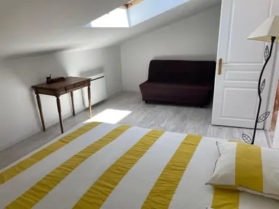 Un ou plusieurs lits dans un hébergement de l'établissement Charentaise contemporaine