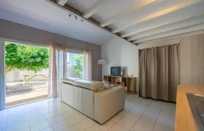 Télévision ou salle de divertissement dans l'établissement Appartement L'écrin de Lumière - Résidence Kiwi