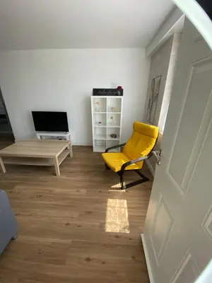 Télévision ou salle de divertissement dans l'établissement La maison des rêves t4 avec jardin