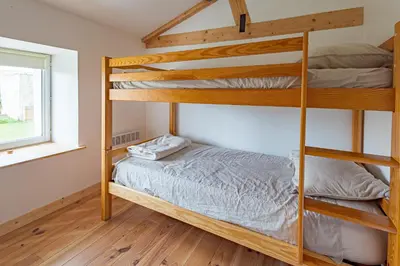 Un ou plusieurs lits dans un hébergement de l'établissement Gîte de Chantemerlière