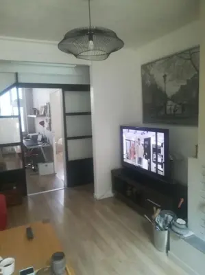 Télévision ou salle de divertissement dans l'établissement Maison de vacances
