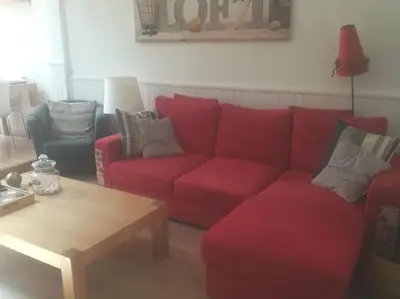 Coin salon dans l'établissement Maison de vacances