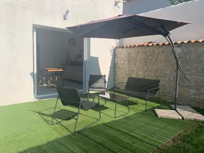 Jardin de l'établissement VIDAGO maison neuve tout confort avec terrasse privée