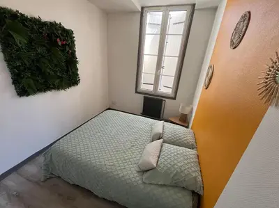 Un ou plusieurs lits dans un hébergement de l'établissement Le petit jardin de Bellune