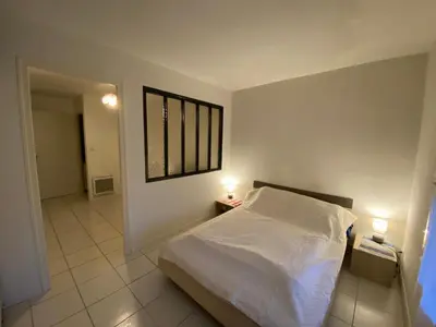 Un ou plusieurs lits dans un hébergement de l'établissement Appartement Duplex Calme, Proche Plage et Centre à Fouras - FR-1-709-78
