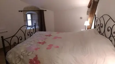 Un ou plusieurs lits dans un hébergement de l'établissement La tour du logis