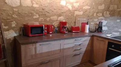Cuisine ou kitchenette dans l'établissement La tour du logis