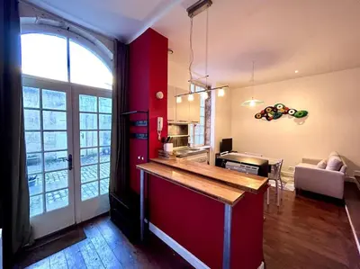 Cuisine ou kitchenette dans l'établissement Le Puyravault - Studio situé en plein centre-ville & proche des thermes