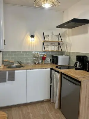 Cuisine ou kitchenette dans l'établissement Les Carmélites : central à 5 min à pied de la Gare