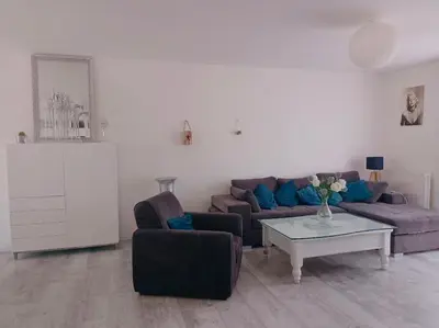 Coin salon dans l'établissement Maison plain pied 2 chambres