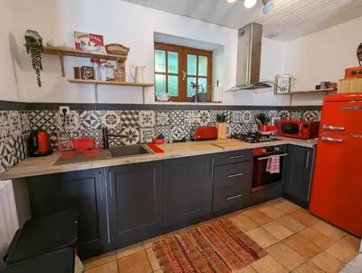 Cuisine ou kitchenette dans l'établissement Chez Betty