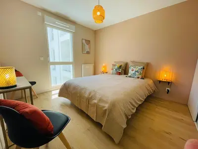 Un ou plusieurs lits dans un hébergement de l'établissement T2 neuf quartier Vieux Port avec ascenseur et terrasse