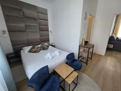 Un ou plusieurs lits dans un hébergement de l'établissement G4 - Appartement 2 ch Climatisé Centre Angoulême