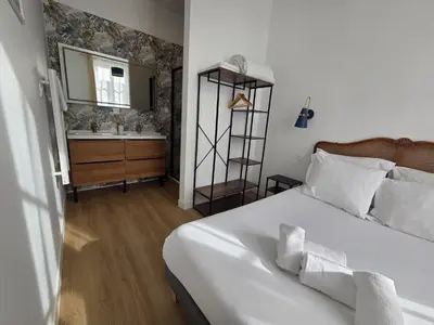 Un ou plusieurs lits dans un hébergement de l'établissement G4 - Appartement 2 ch Climatisé Centre Angoulême