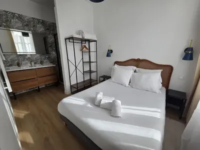Un ou plusieurs lits dans un hébergement de l'établissement G4 - Appartement 2 ch Climatisé Centre Angoulême