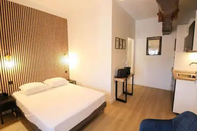 Un ou plusieurs lits dans un hébergement de l'établissement G5 Appartement Climatisé Centre Angouleme