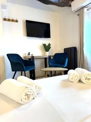 Un ou plusieurs lits dans un hébergement de l'établissement G5 Appartement Climatisé Centre Angouleme