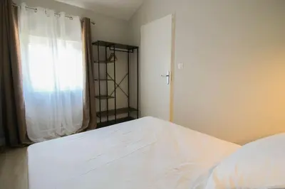 Un ou plusieurs lits dans un hébergement de l'établissement G6 Appartement Climatisé au calme centre Angouleme
