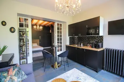 Cuisine ou kitchenette dans l'établissement G7 Loft SPA & Terrasse centre Angouleme