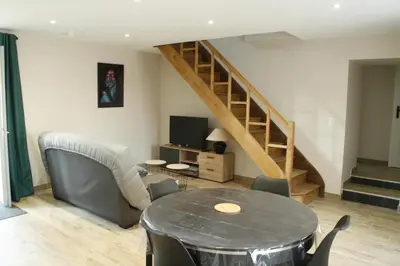 Télévision ou salle de divertissement dans l'établissement Gîte du Four Banal