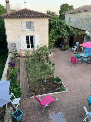 Jardin de l'établissement Chambre améliorée dans petite maisonnette, Au moulin du bonheur