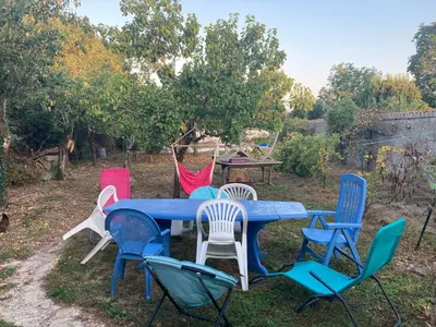 Jardin de l'établissement Chambre améliorée dans petite maisonnette, Au moulin du bonheur