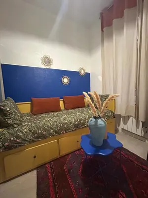 Coin salon dans l'établissement YOUSRA Appartement