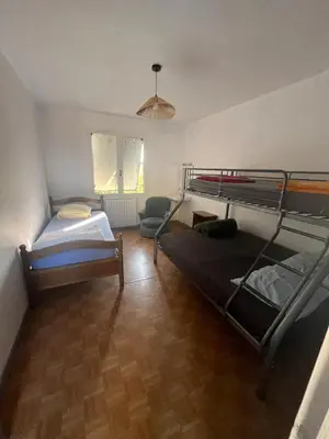 Un ou plusieurs lits dans un hébergement de l'établissement Gîte voyageurs
