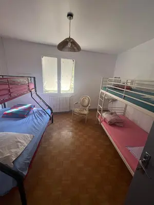 Un ou plusieurs lits dans un hébergement de l'établissement Gîte voyageurs