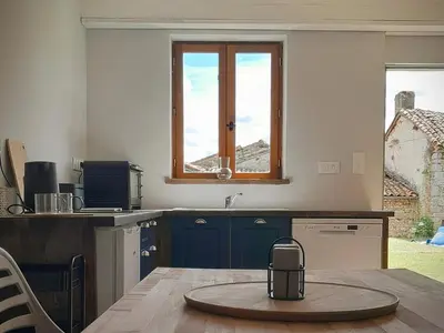 Un ou plusieurs lits dans un hébergement de l'établissement Serenity Belle France Gite