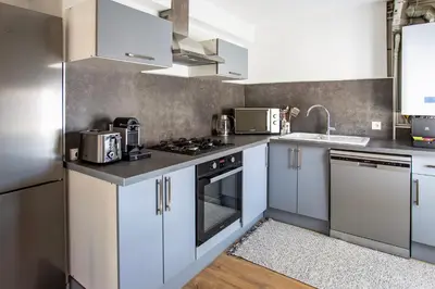 Cuisine ou kitchenette dans l'établissement Appartement entier - Centre historique