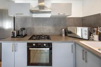 Cuisine ou kitchenette dans l'établissement Appartement entier - Centre historique