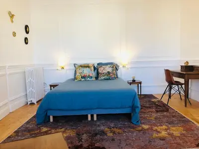 Un ou plusieurs lits dans un hébergement de l'établissement L'Hôtel Particulier du 12