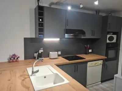 Cuisine ou kitchenette dans l'établissement Le BEAU SEJOUR