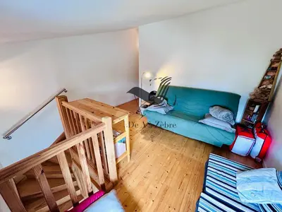 Coin salon dans l'établissement ChaviD 17 - Spacieuse maison avec jardin