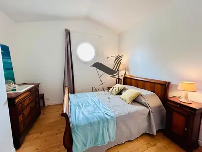 Un ou plusieurs lits dans un hébergement de l'établissement ChaviD 17 - Spacieuse maison avec jardin