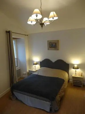 Un ou plusieurs lits dans un hébergement de l'établissement Gîte de la Villa André