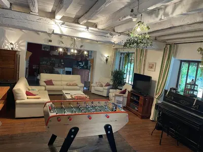 Coin salon dans l'établissement Gîte de la Villa André