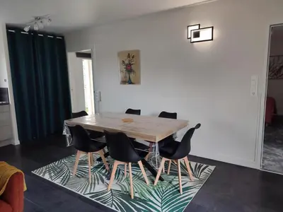 Coin salon dans l'établissement Maison des Hauts, terre de lavoirs