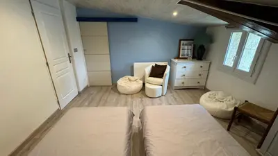 Un ou plusieurs lits dans un hébergement de l'établissement Chambres d'hôtes Les Rozières
