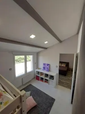 Un ou plusieurs lits dans un hébergement de l'établissement Gîte Ô Pallinois Proche Futuroscope de Poitiers