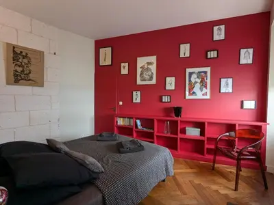 Un ou plusieurs lits dans un hébergement de l'établissement Appartement avec terrasse, jardin et WIFI au cœur historique d'Angoulême - FR-1-653-263