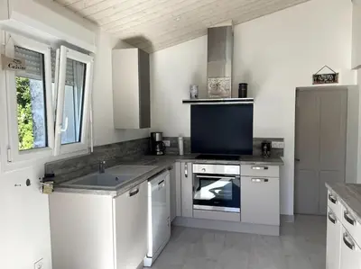 Cuisine ou kitchenette dans l'établissement Le logis des Lilas