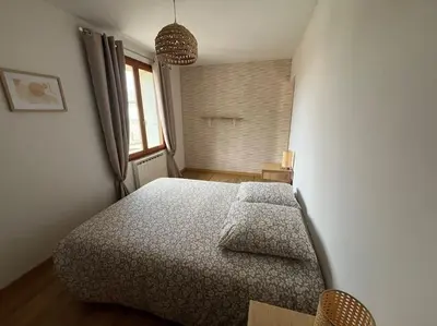 Un ou plusieurs lits dans un hébergement de l'établissement Gîte - Comme à la maison