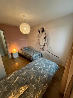 Un ou plusieurs lits dans un hébergement de l'établissement Gîte - Comme à la maison